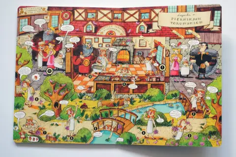 Ilustracja przedstawia scenę z legendy o piernikach toruńskich. Królowa i królewicz w pracowni piernikarskiej, otoczeni przez pomocników i zwierzęta.